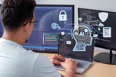 Junger Informatiker programmiert künstliche Intelligenz
